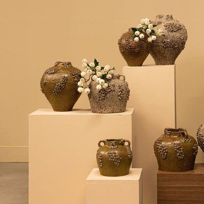 Deisy Green Ceramic Jar With Handles Rough Coral S van PTMD, groene keramische pot in een sfeervolle interieursetting