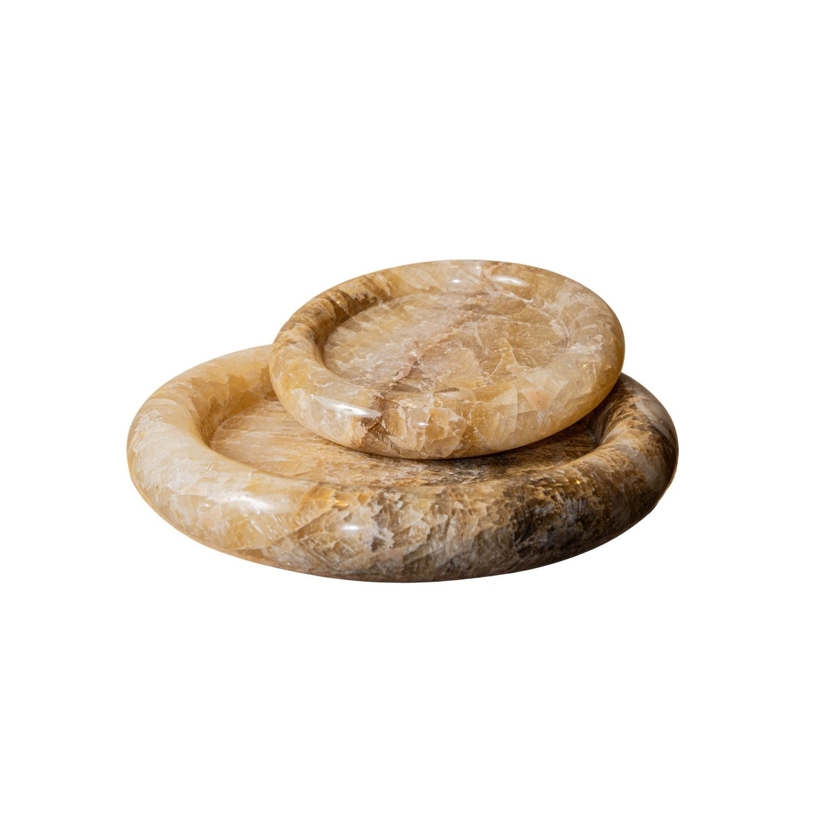 Detail van de honingkleurige aders in het onyx van de Jiren schalen