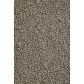 Het taupe Noble vloerkleed van MUST Living van dichtbij met zichtbare vezels